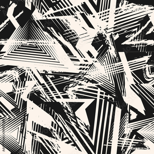 Abstract black and white grunge seamless pattern. Urban art texture with chaotic shapes, lines, triangles, brush strokes. Monochrome graffiti style vector background. Repeat design for decor, prints