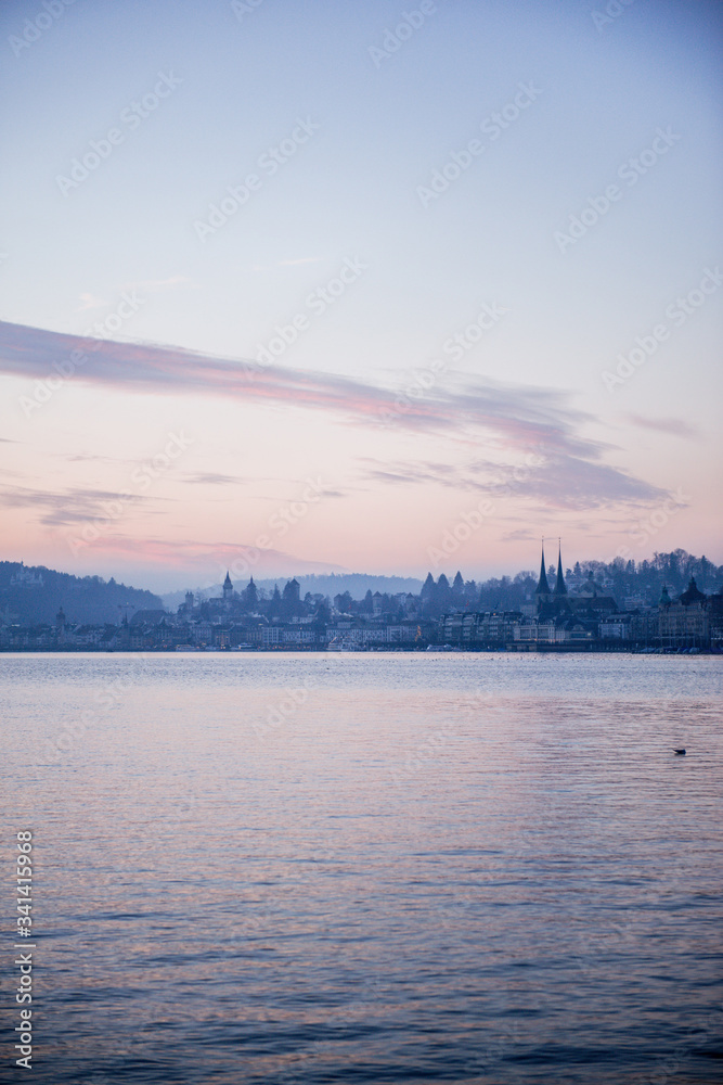 Lucerne city in a veil of pink sunset