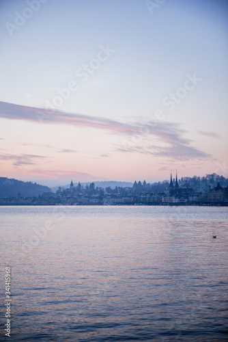 Lucerne city in a veil of pink sunset © Jana