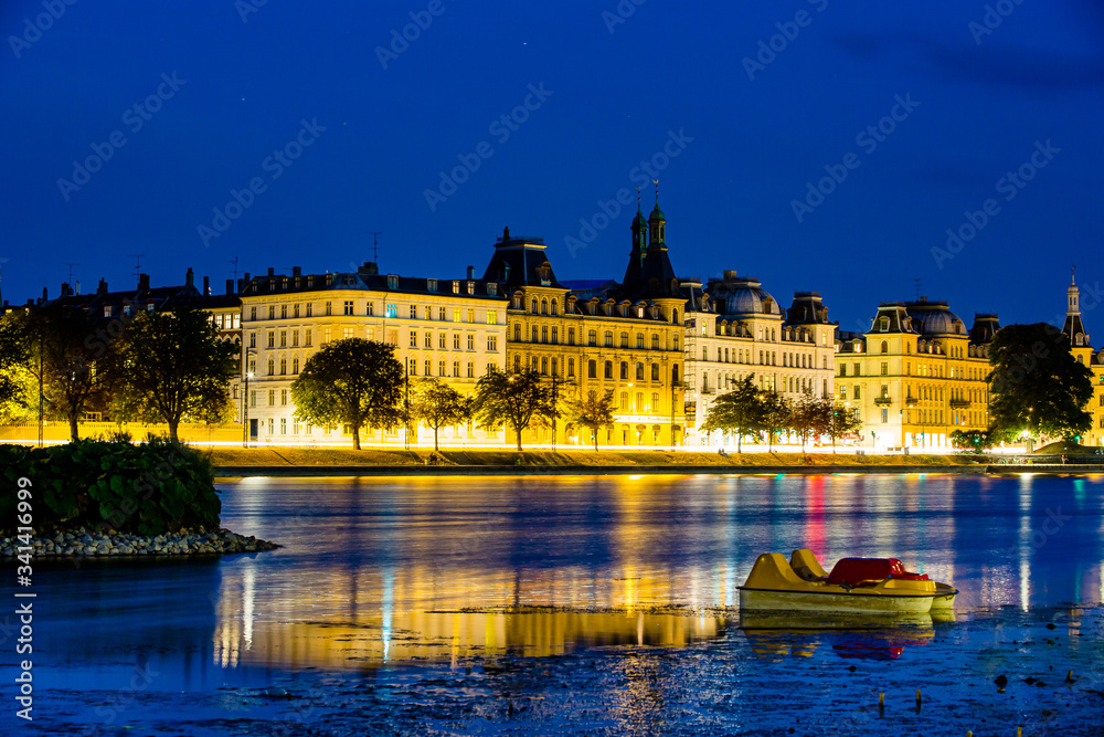 Twilight view of old historical buildings in Copenhagen over the water