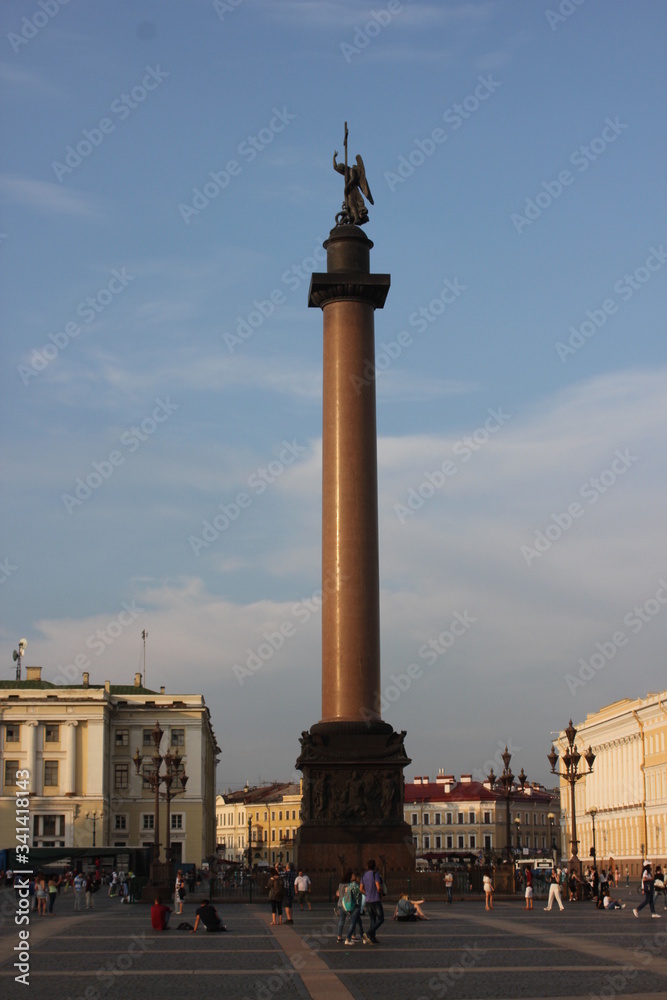 Saint Petersburg, Russia : June 2019 -Palace square architecture with Alexander column and historic buildings on summer day. Vintage style postcard of Saint Petersburg cityscape with main city square.