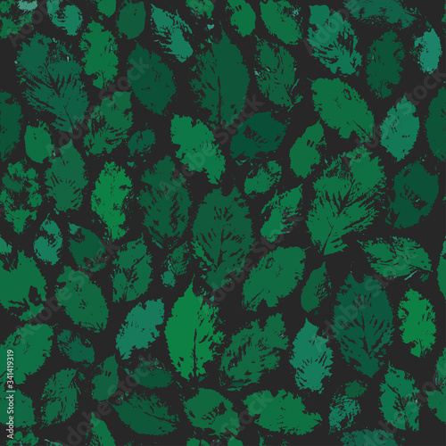 Leaves prints seamless pattern in deep green colors