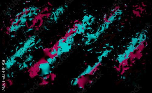 Colored abstract wallpaper on a black background with raindrops on glass