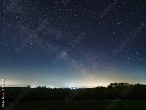 night sky with stars and clouds early before dawn at spring 