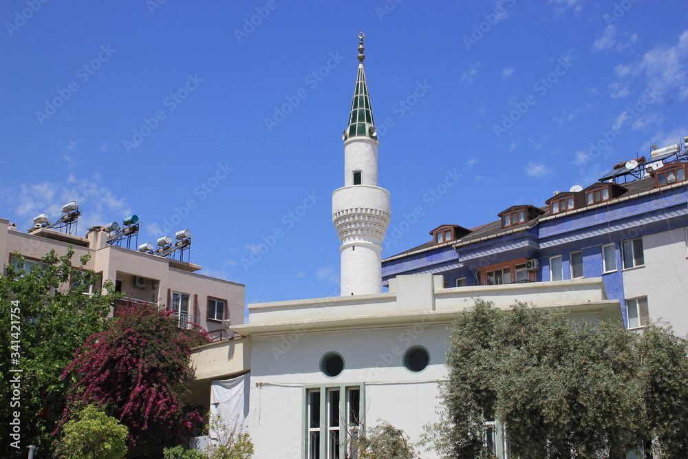 Milas, Mugla, Turkey: July 14 2016 - White mosque in city center of Milas