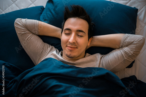 Sweet dreams. Health care concept. Circadian rhythm regulates sleep wake cycle. Man handsome unshaven guy in bed.