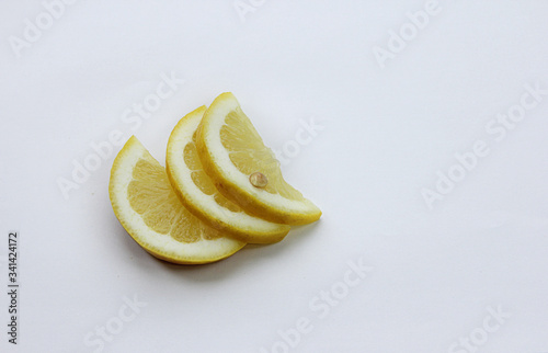 sliced lemon on a white background