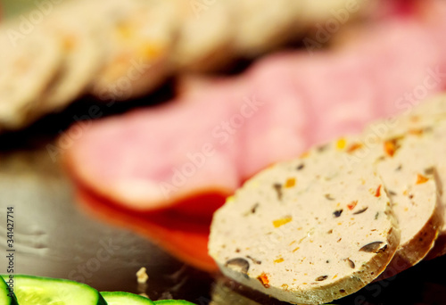 Slices of Salami kept as appetizer