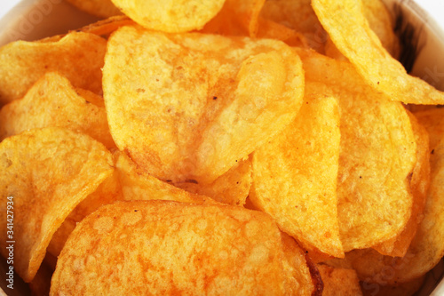 potato chips in a white bowl, macro