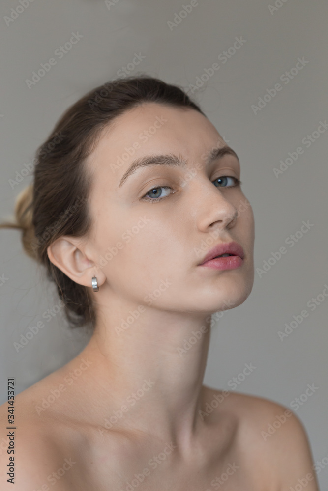 Beauty portrait of young female with glowing skin Beauty portrait of young female with glowing skin
