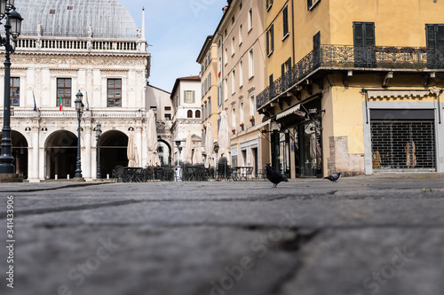 A street level view of the completely empty Loggia Square in Brescia (Lombardy, Italy).
