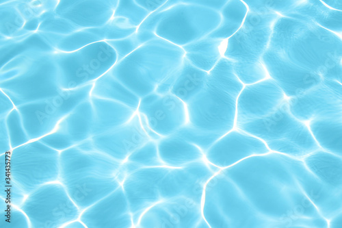 Perfect texture of clear blue water in the swimming pool. Top view. Abstract background