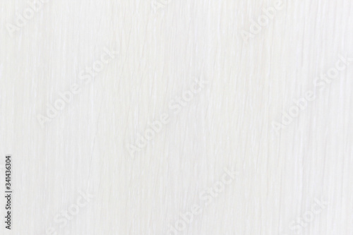 Simple white background with pastel striped pattern.