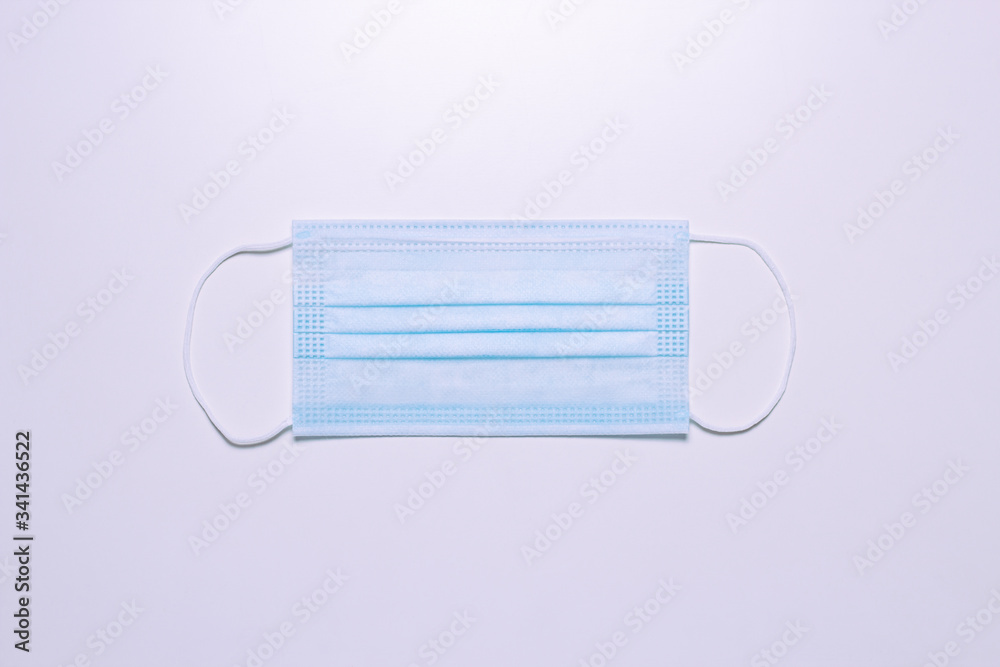 Protection against COVID-19 concept. Brand new mask isolated Protection against COVID-19 concept. Brand new mask isolated