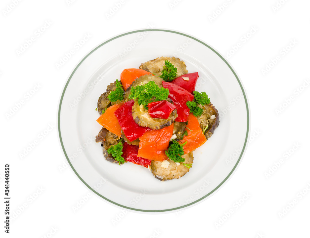 Plate with eggplant, paprika and parsley, isolated on white background Plate with eggplant, paprika and parsley, isolated on white background