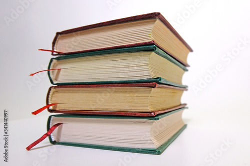 Book stack on a white background with bookmarks on classic  vintage style