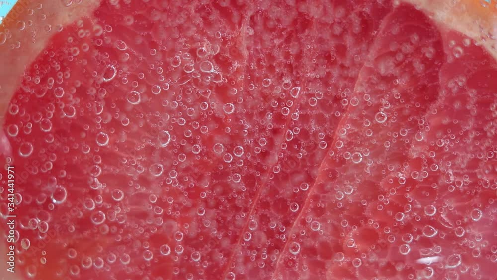 grapefruit fruit under water in water close-up. juicy fruit for juice, citrus grapefruit fruit under water in water close-up. juicy fruit for juice, citrus