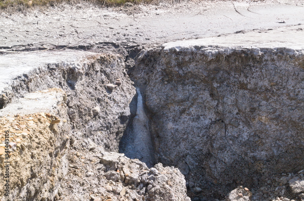 Kalush, Ukraine, 2020: Potassium salts withdrawal from soil. Gray soil, ore. Kalush, Ukraine, 2020: Potassium salts withdrawal from soil. Gray soil, ore.
