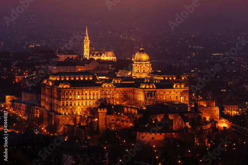Buda Castle and St. Matthias in the night illumination.