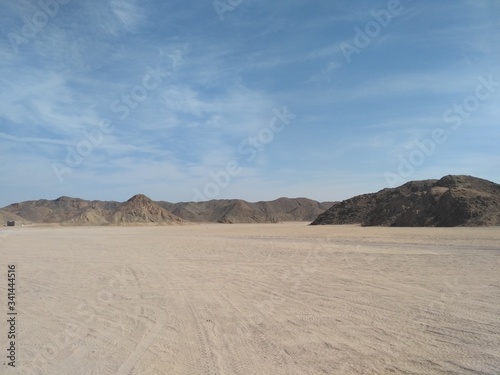 Landscape of stone desert in Egypt. Safari in the desert. Extreme entertainment and active leisure in Egypt resorts.