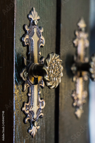 ornate knob on antique furniture