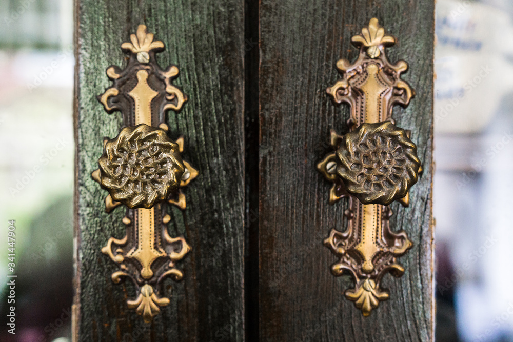 ornate knob on antique furniture