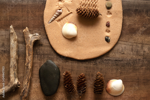Modeling with salt dough on the kitchen table. Natural materials for the game, the natural composition of the product. Creative development of children in the period of self-isolation