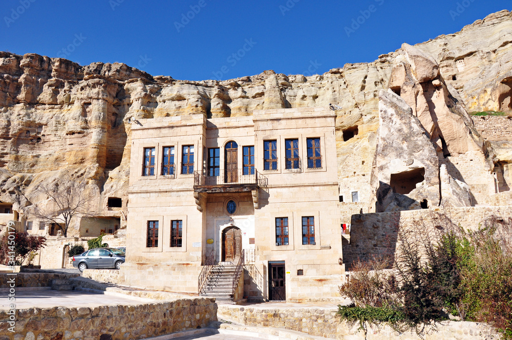 Hand-carved stone houses, patterns on the walls and windows Hand-carved stone houses, patterns on the walls and windows