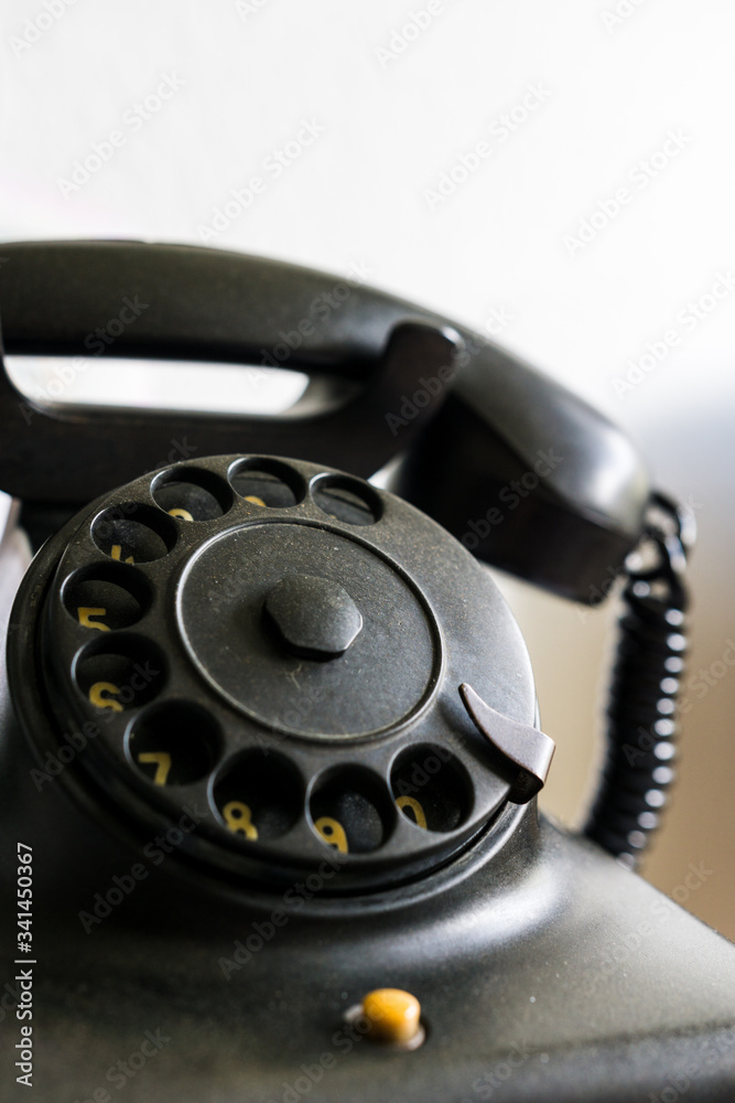 old telephone with dial disk from german democratic republic
