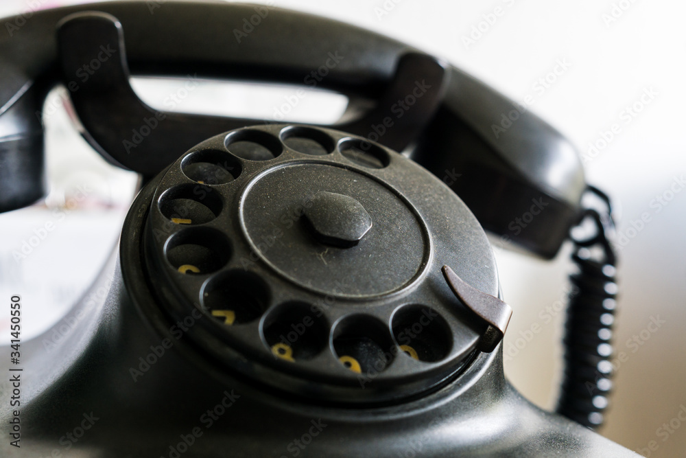 old telephone with dial disk from german democratic republic