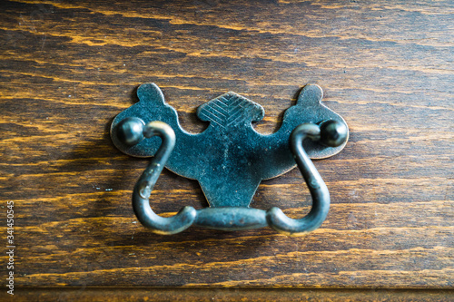 Obraz na płótnie ornate handle from metal on antique funrniture w salonie