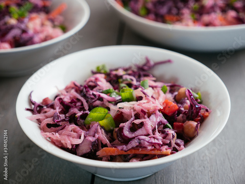 Home made vegan Red Cabbage, Chickpea Slaw with Sauerkraut, carrots and bell pepper.