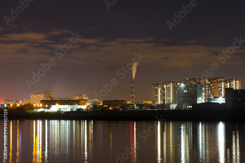 Night city lights reflected in the river. Nizhny Novgorod, the river Oka. © ivan_kuznetsov
