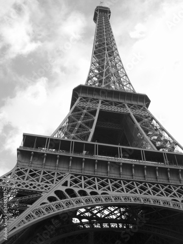 Eiffel Tower in Paris in Black and White with a cloudy sky,