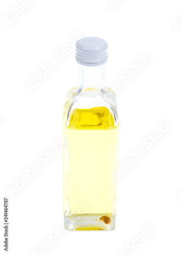 Small glass bottle with truffle oil Isolated on White background