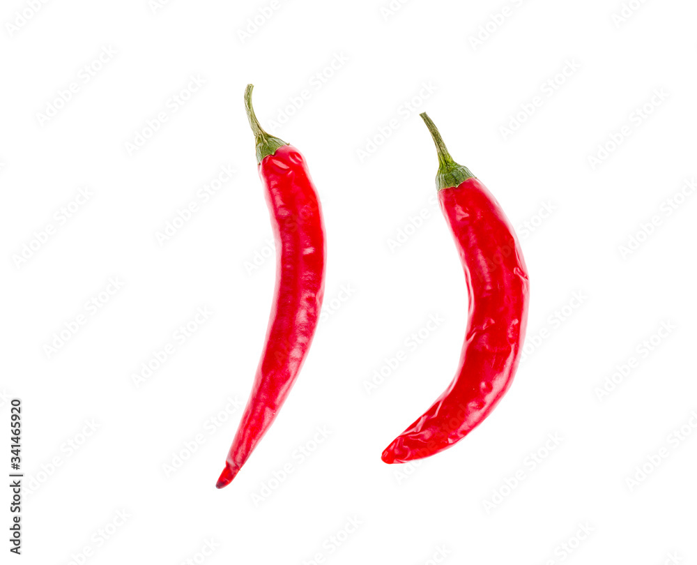 Two red small red chili peppers isolated on white background.