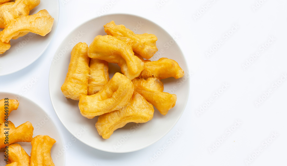 Deep-fried dough stick, chinese bread stick on white. Deep-fried dough stick, chinese bread stick on white.