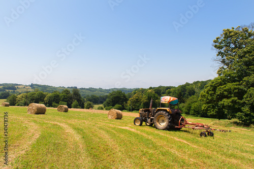 Agricultural landscape with round hay bales