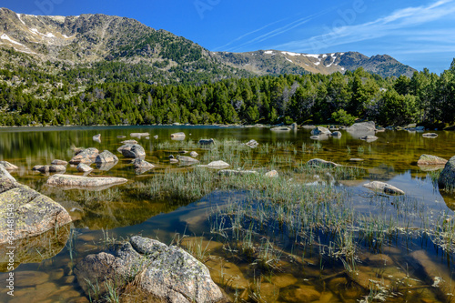 Morning at the beautiful Lake of Malniu, Catalan Pyrenees Mountains, Spain.