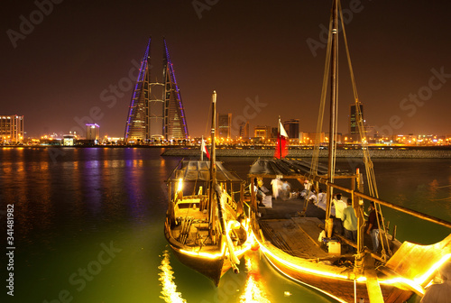 People visits at the coast of Bahrain bay to see and ride on traditional fishing boat  Dhow 