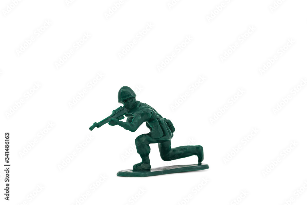 Green toy soldiers on white background. Soldier six on six models. (6/6) Picture six on sixteen viewing angles. (06/16)