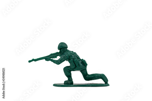 Obraz na plátně Green toy soldiers on white background