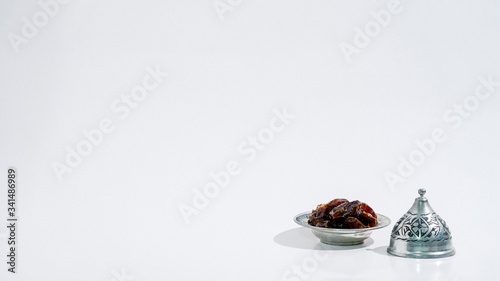 Ramadan Dates on White background. Festive Greeting Card, Invitation for Muslim Holy Month Ramadan Kareem