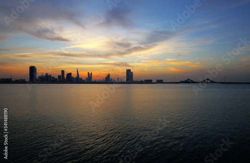 Bahrain skyline at dusk with beautiful clouds, HDR