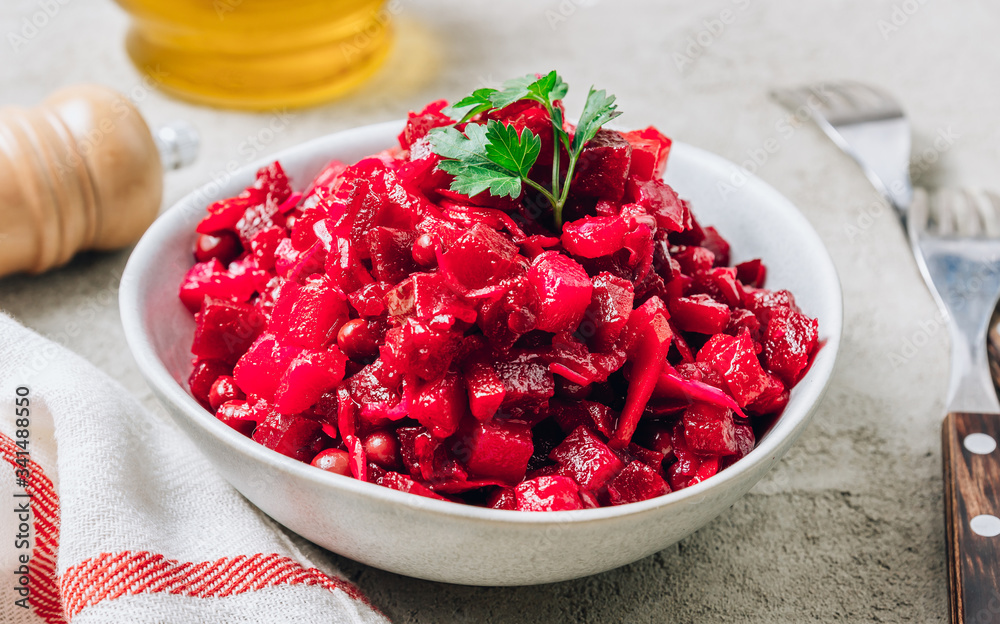 Beet salad. Russian beetroot salad with beetroot, potato, carrot, pea and oil dressing