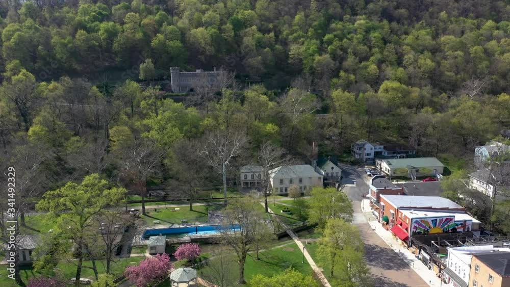 Aerial ascent showing the state park, castle, shops in the small town of Berkeley Springs, WV in the Appalachian mountains. Aerial ascent showing the state park, castle, shops in the small town of Berkeley Springs, WV in the Appalachian mountains.