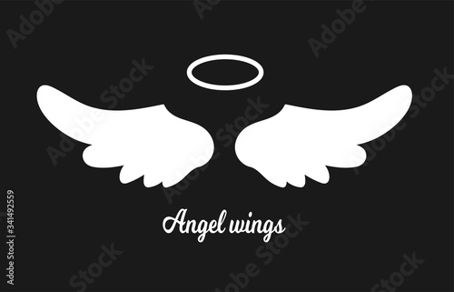 White Angel wings icon with nimbus isolated on dark background - stock vector