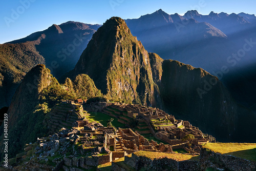 The sun rising over Machu Picchu, Peru