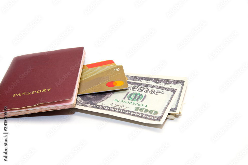 passport with bank cards and dollars. The face value of banknotes is 100 dollars. passport with bank cards and dollars. The face value of banknotes is 100 dollars.