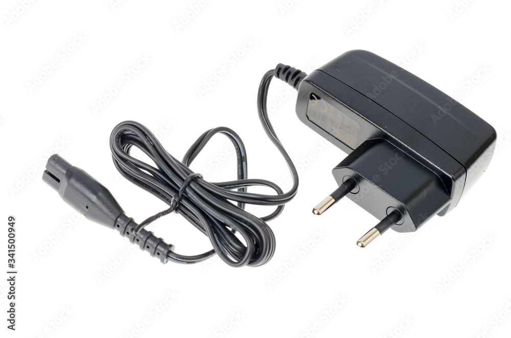 Black charger isolted on white background. Photo Black charger isolted on white background. Photo